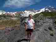 Angela Cranney posing on the divide at Emerald Ridge.